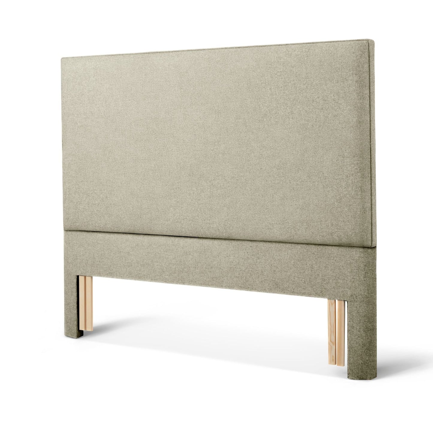 The Woolroom Broadway Floor Standing Headboard in Light Grey upholstery can be added seamlessly to a bed.