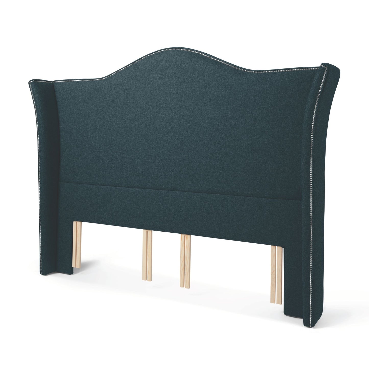 The Stoneywell Floor Standing Headboard in Pine dark green upholstery is a grand design with wings and nailhead trim.