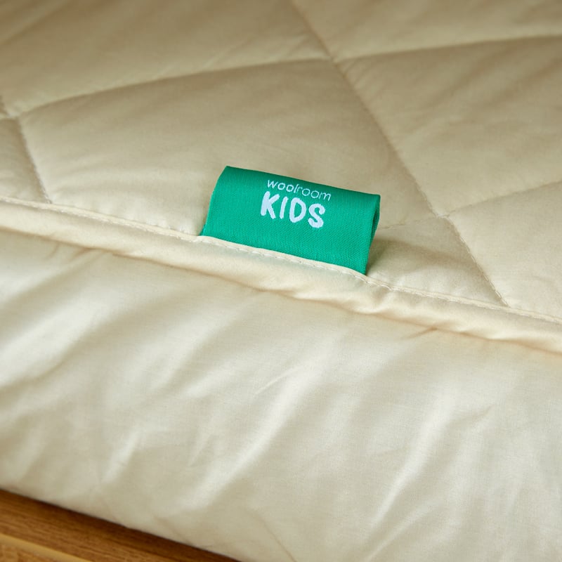 Deluxe Washable Wool Kids Mattress Protector from Woolroom – natural kids bedding for better sleep