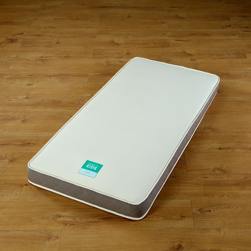 The Luxury Woolroom Kids Mattress without a cover or sheet is the thickest crib mattress available in two sizes.