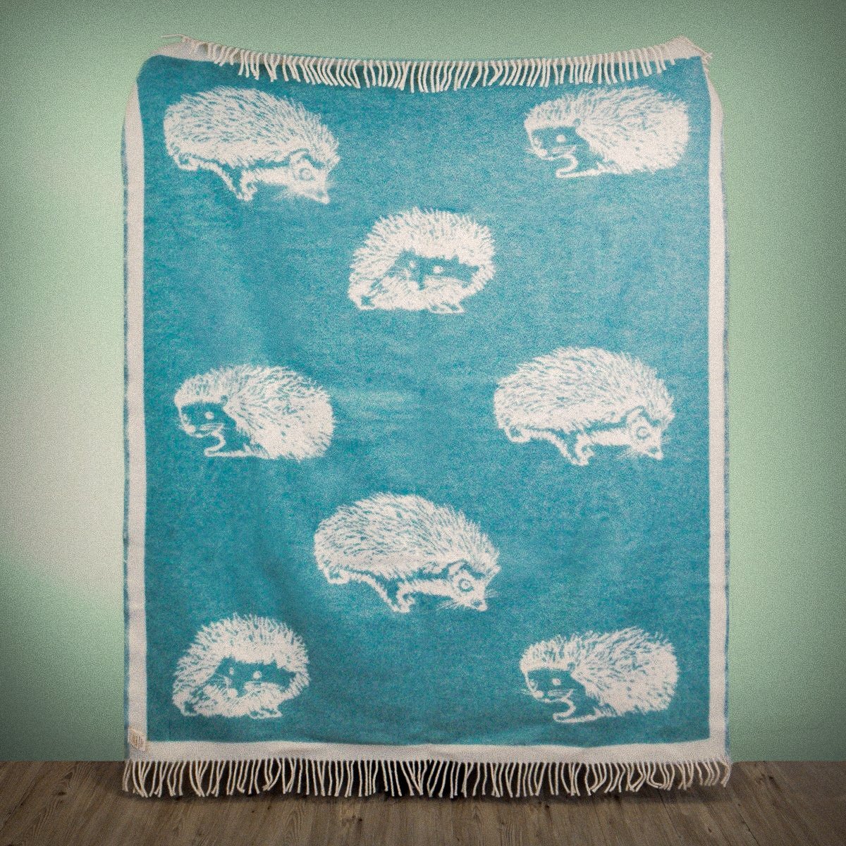 Product image of Wild and Wool Hedgehog Wool Throw - Teal by Woolroom – premium wool throws