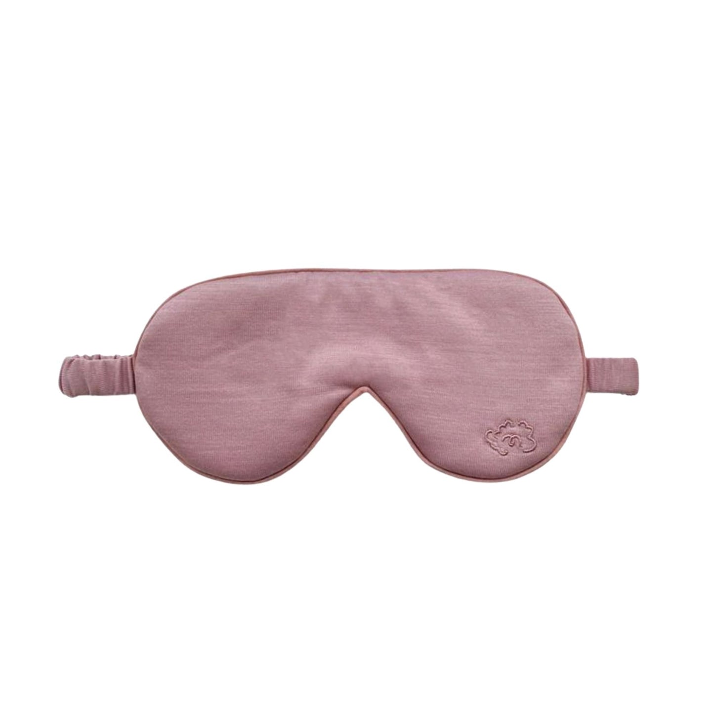 The Woolroom Merino Eye Mask in rose is soft and good for sleeping comfortably while blocking out light.