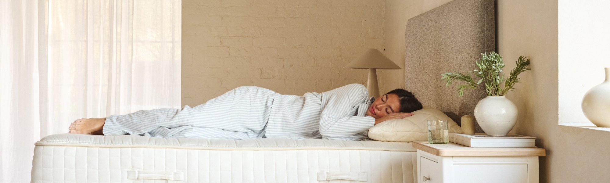 Lady lying on a woolroom mattress