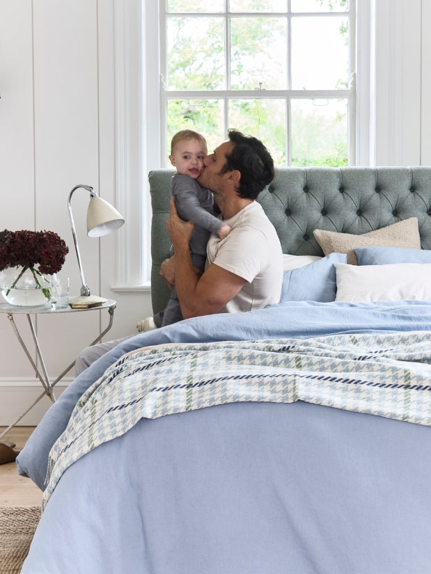 Father and son in bed