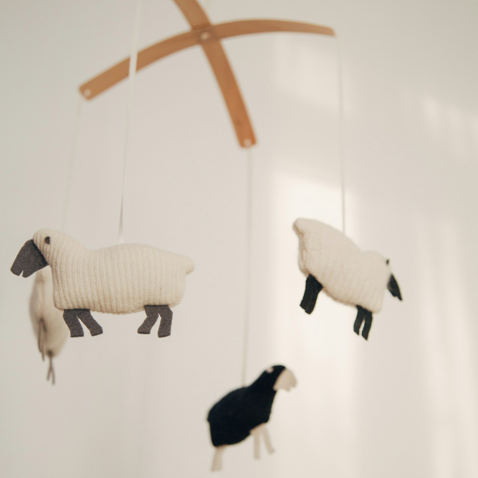 A Sheep themed baby sleep mobile