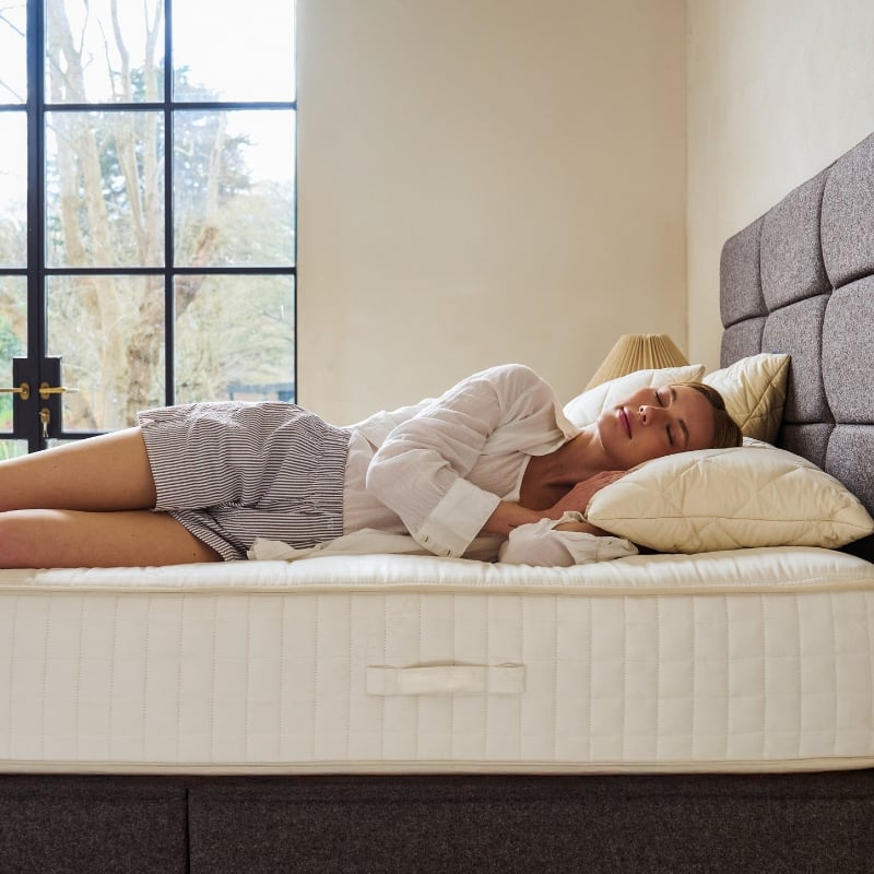 Benefits of Sleeping on Wool: The Natural Choice for Healthier Sleep -  Lady sleeping