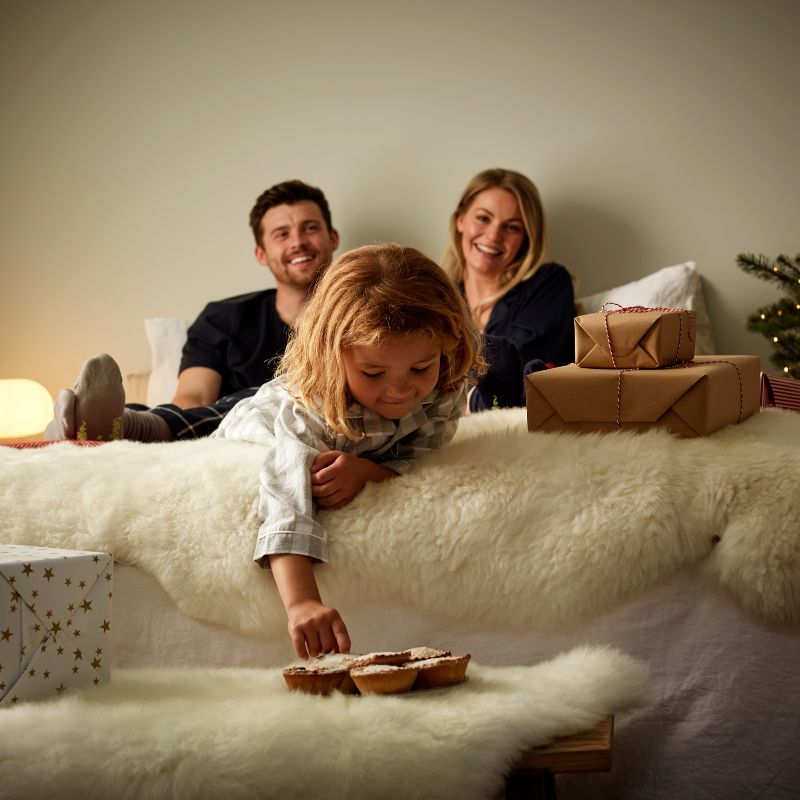 Ultimate Cozy Night - Festive family in bed