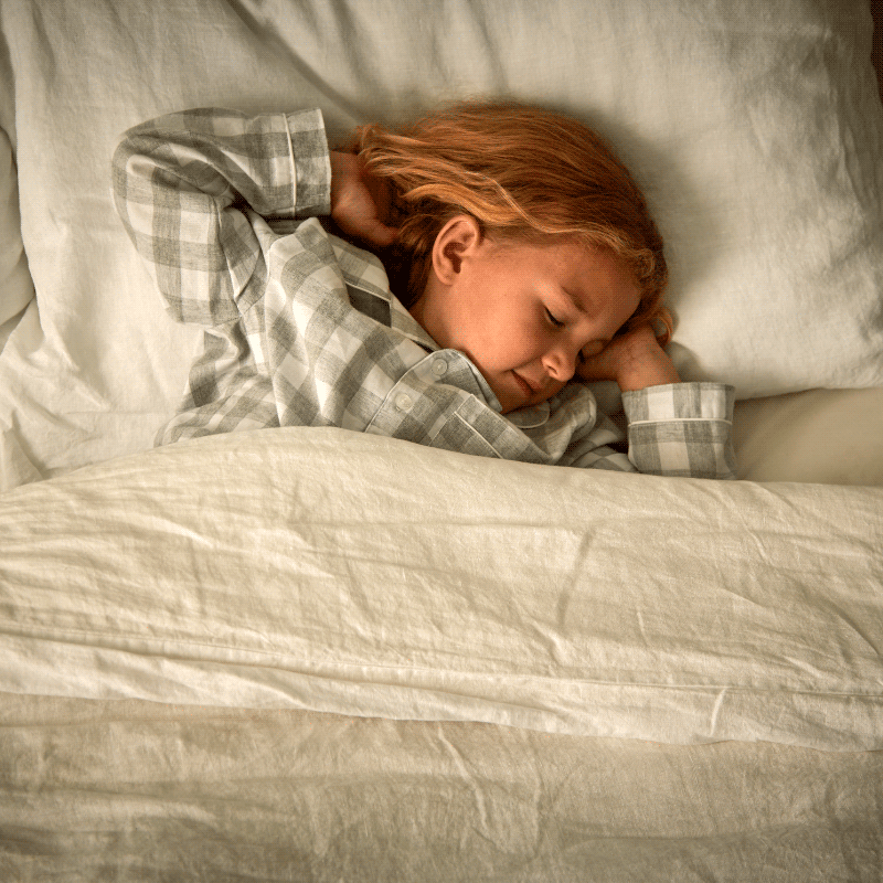 How to Sleep Better at Night - Toddler sleeping in bed