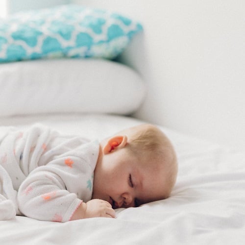 sleeping baby on woolroom mattress