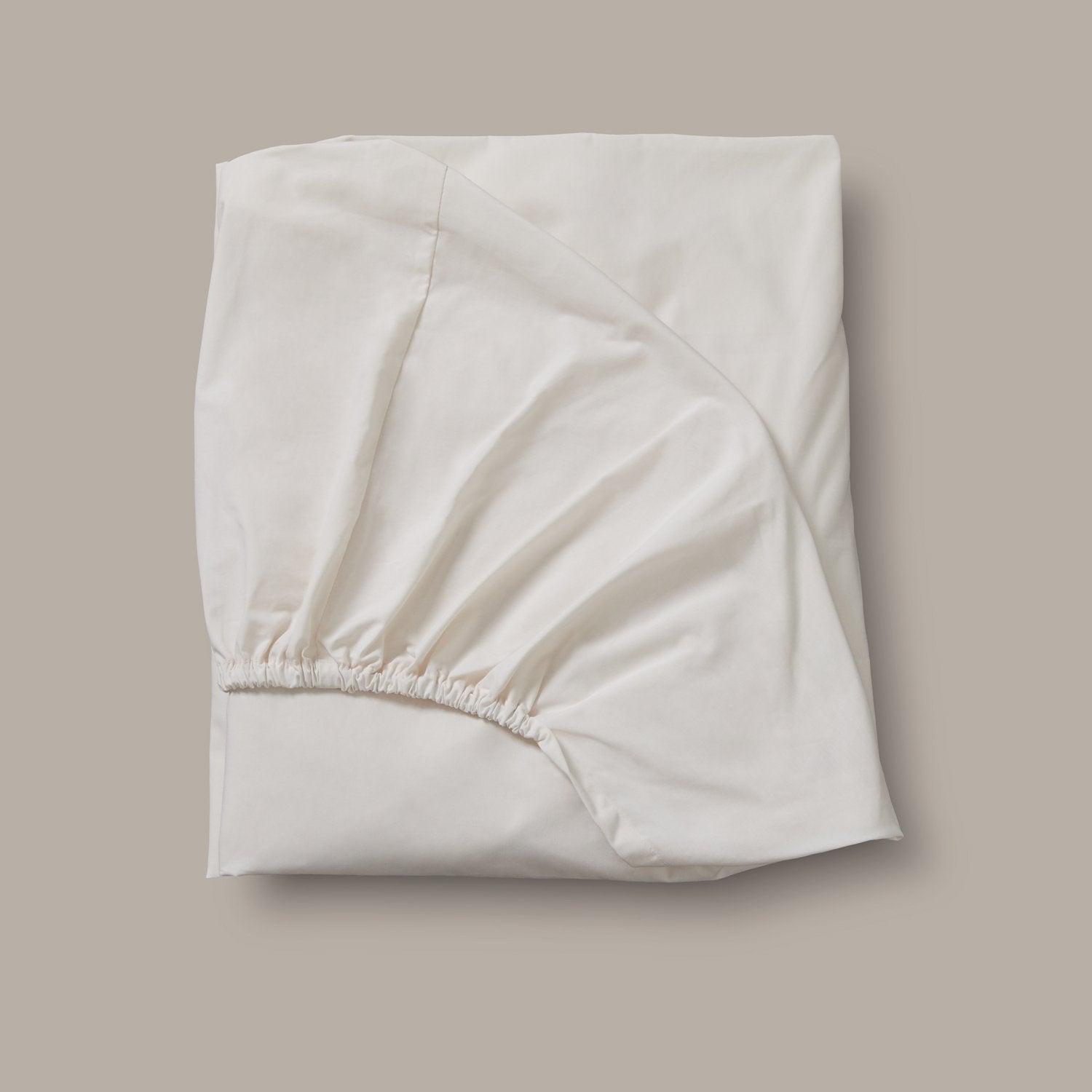 Product image of Arinta Organic Cotton Fitted Sheet - Vanilla by Woolroom – premium organic cotton bedding