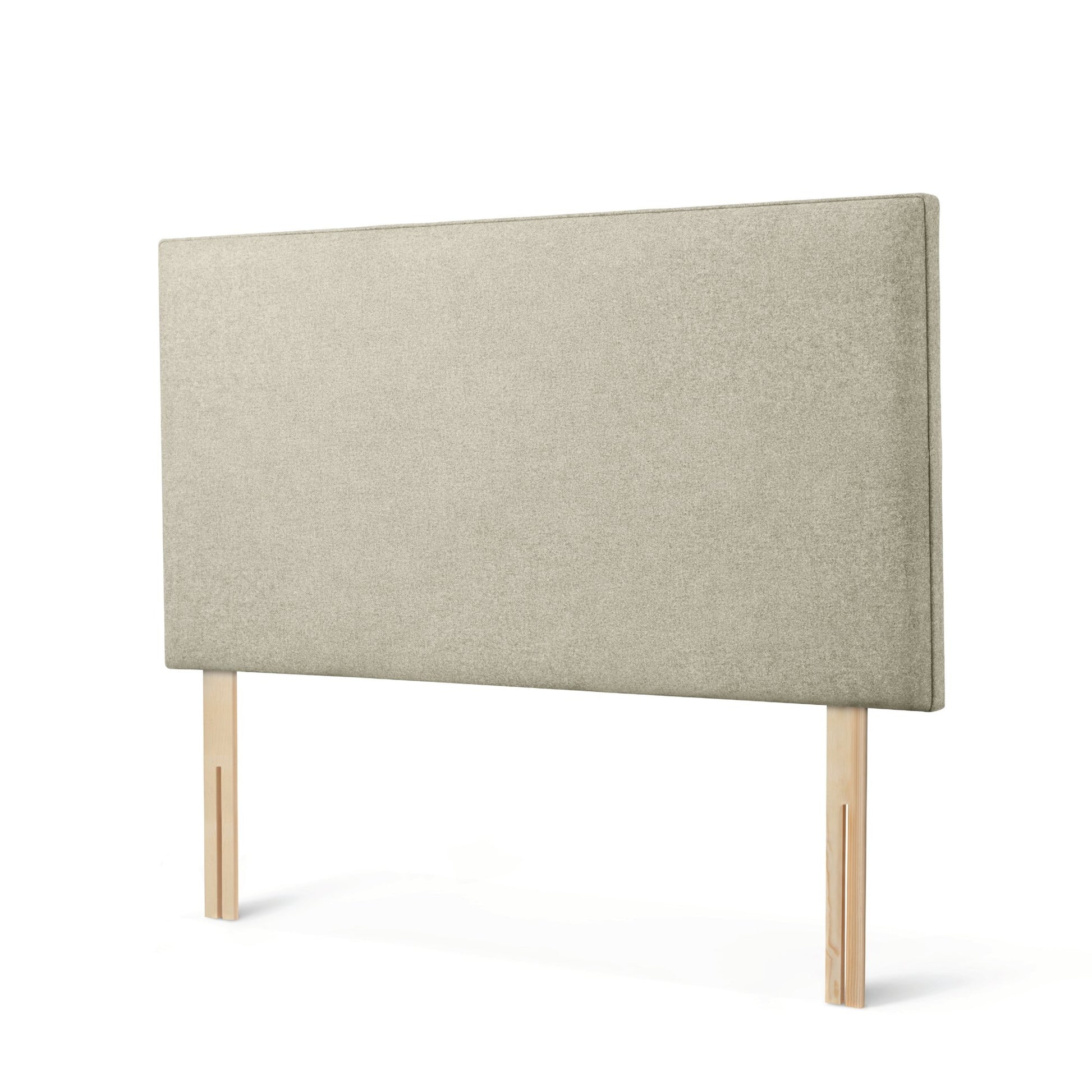 The Woolroom Broadway Strutted Headboard in Light Grey upholstery is a stylish bed-fix bed addition to a bed.