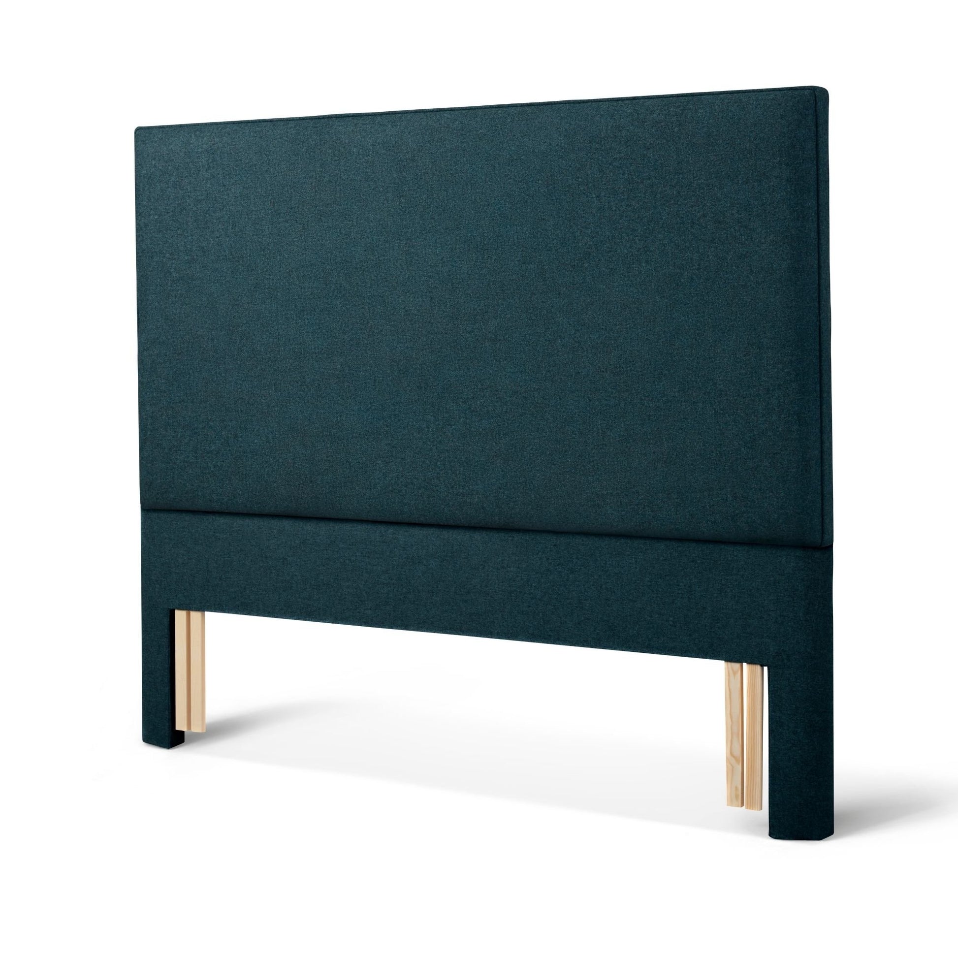 The Woolroom Broadway Floor Standing Headboard in Pine dark green upholster can be added seamlessly to a bed.