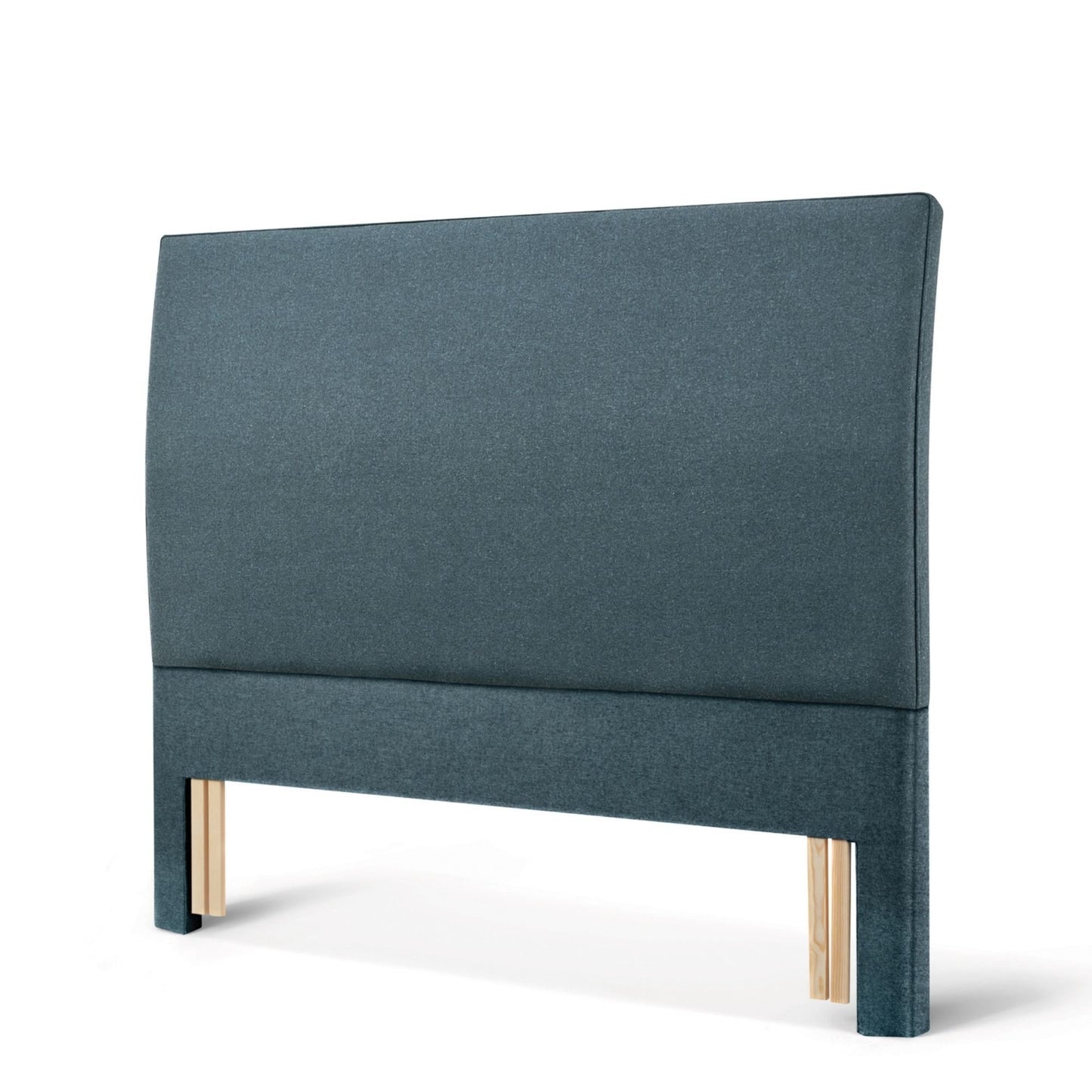 The Woolroom Coleton Floor Standing Headboard in Hemlock blue upholstery has a soft curve and is 100% British wool. 
