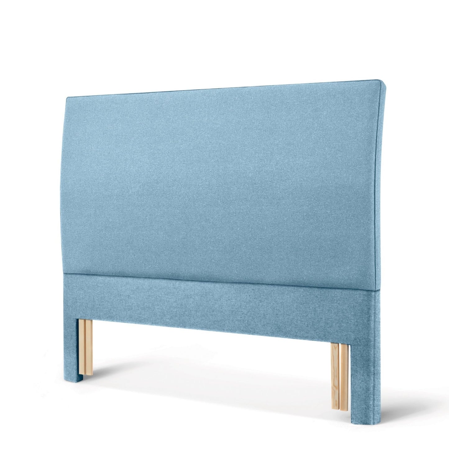 The Woolroom Coleton Floor Standing Headboard in Juniper light blue upholstery has a soft curve and is 100% British wool. 