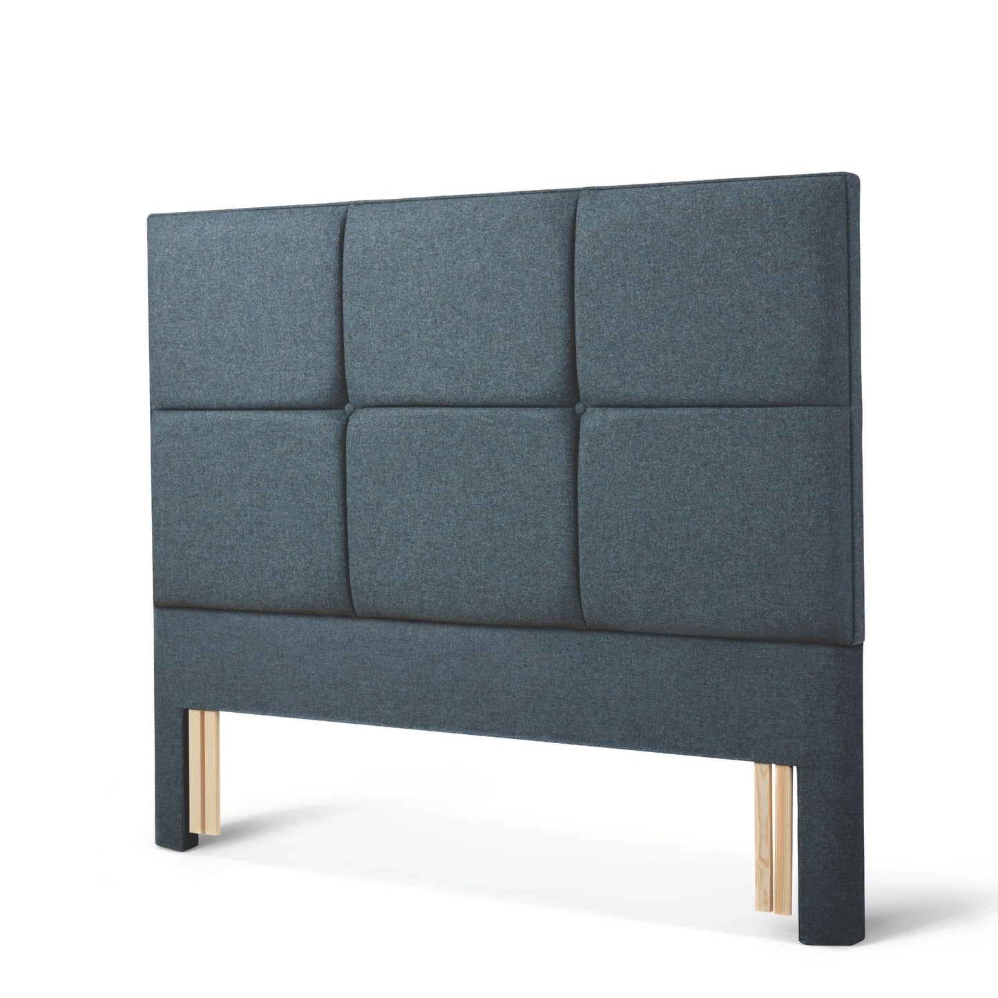 The Woolroom Goddards Floor Standing Headboard in Hemlock blue has upholstered panels and can be added seamlessly to a bed.