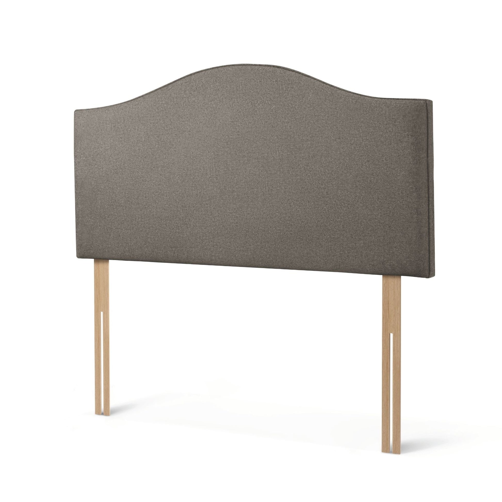 The Woolroom Hidcote Strutted Headboard in dark grey is a classic curved and upholstered bed-fix option for any bed.