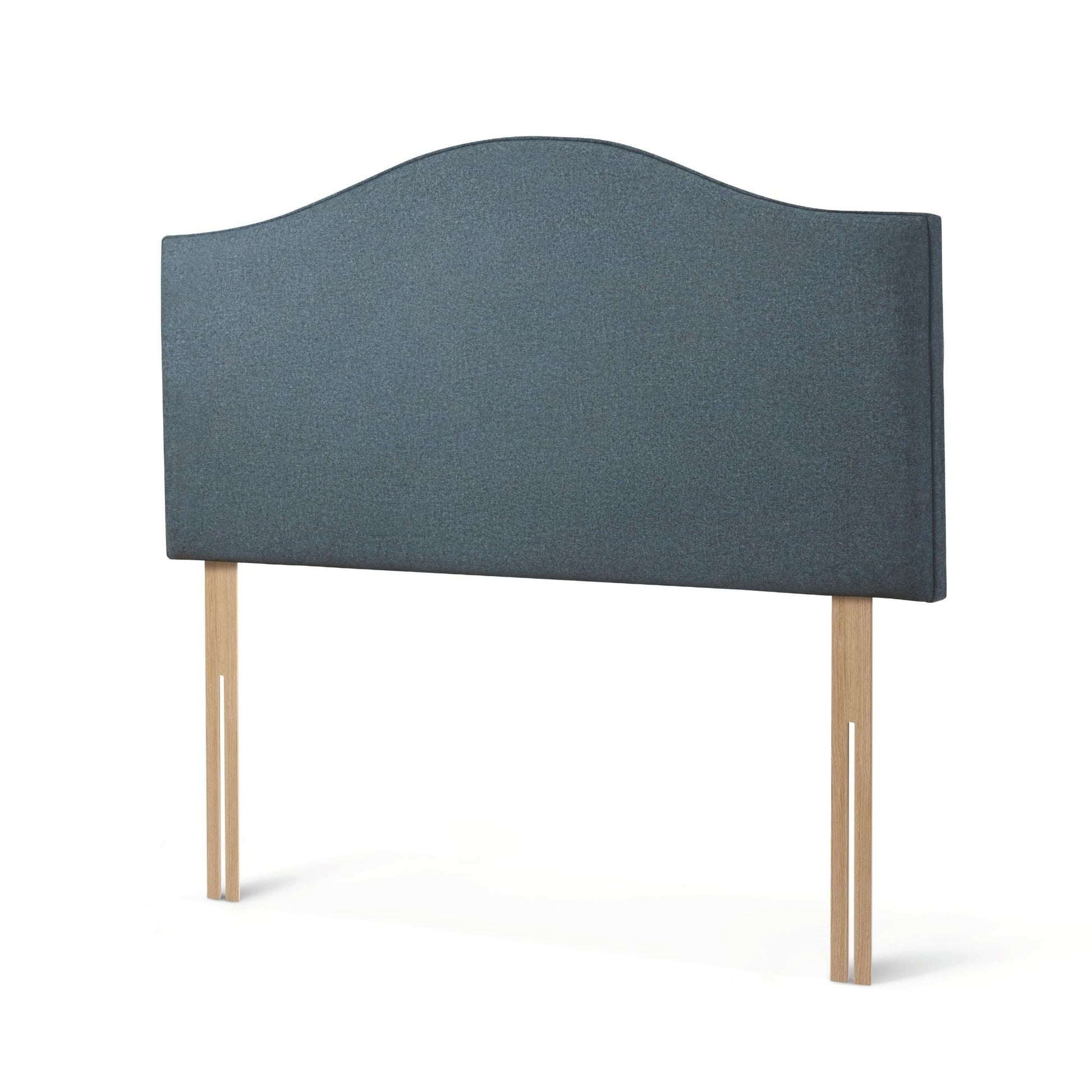 The Woolroom Hidcote Strutted Headboard in Hemlock blue is a classic curved and upholstered bed-fix option for any bed.