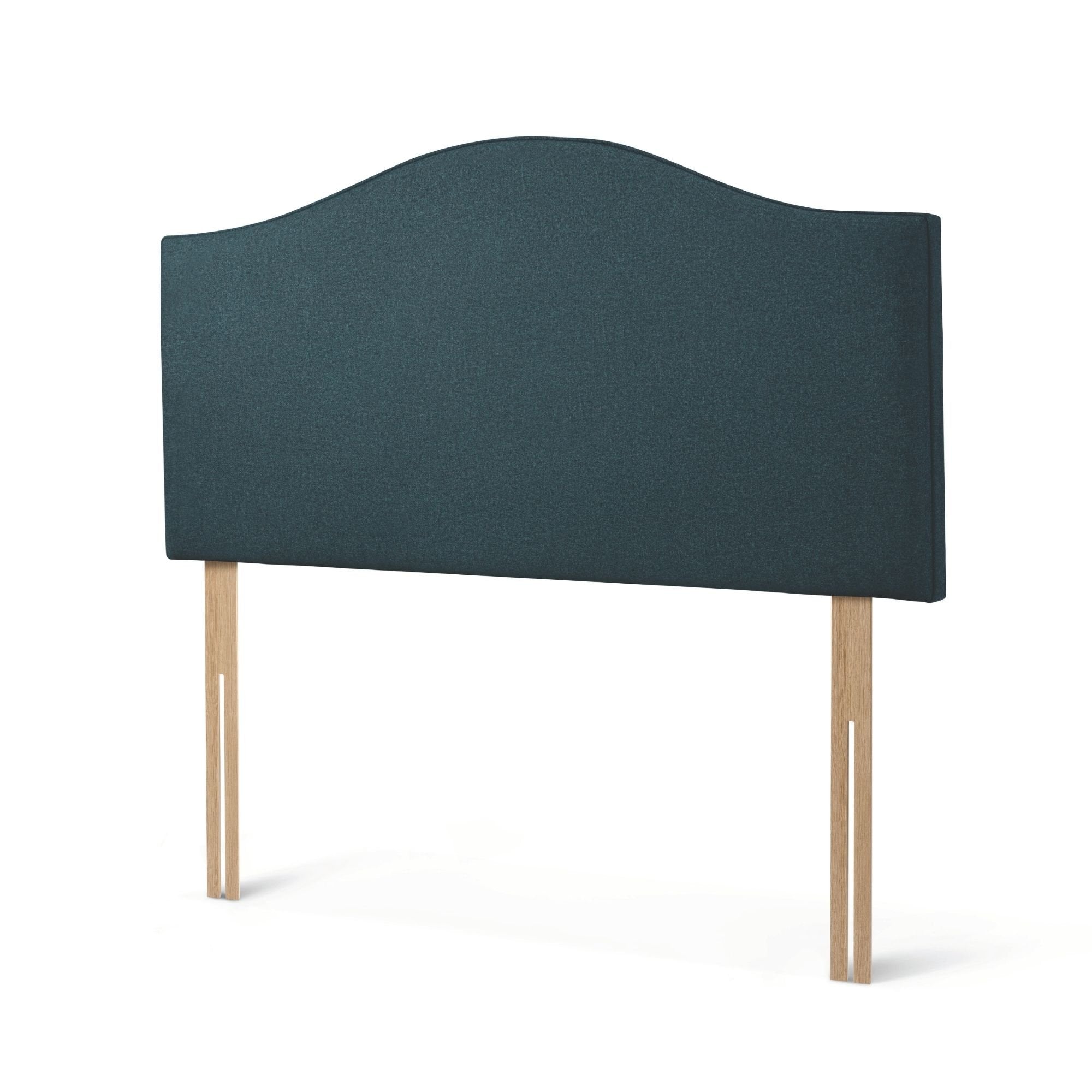 The Woolroom Hidcote Strutted Headboard in Pine dark green is a classic curved and upholstered bed-fix option for any bed.