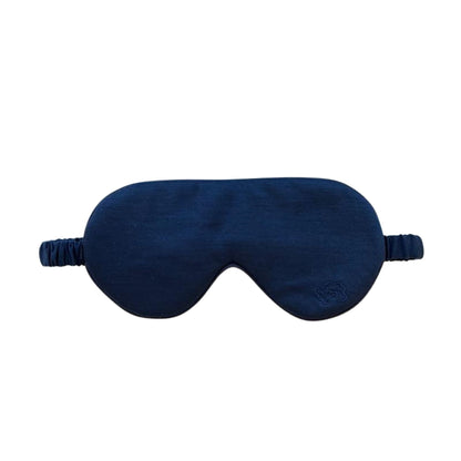 The Woolroom Merino Eye Mask in navy is soft and good for sleeping comfortably while blocking out light. 