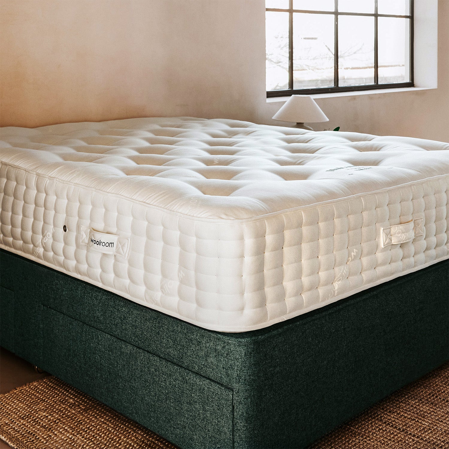 The side view of the Holcome wool mattress by Woolroom.