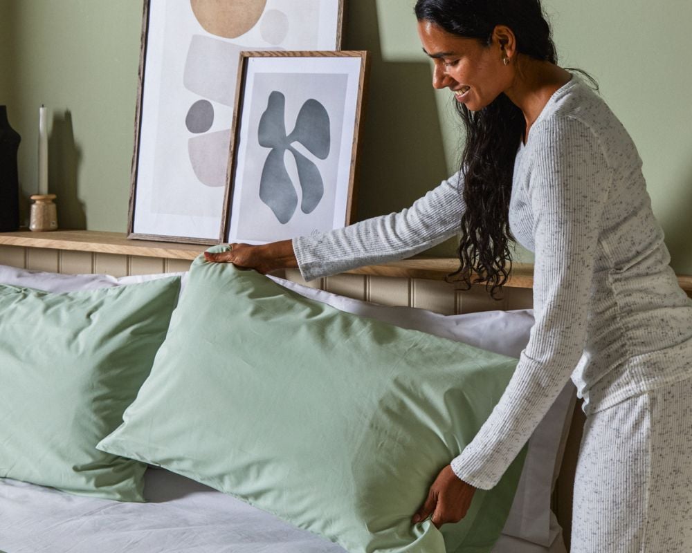 Lady laying bedding