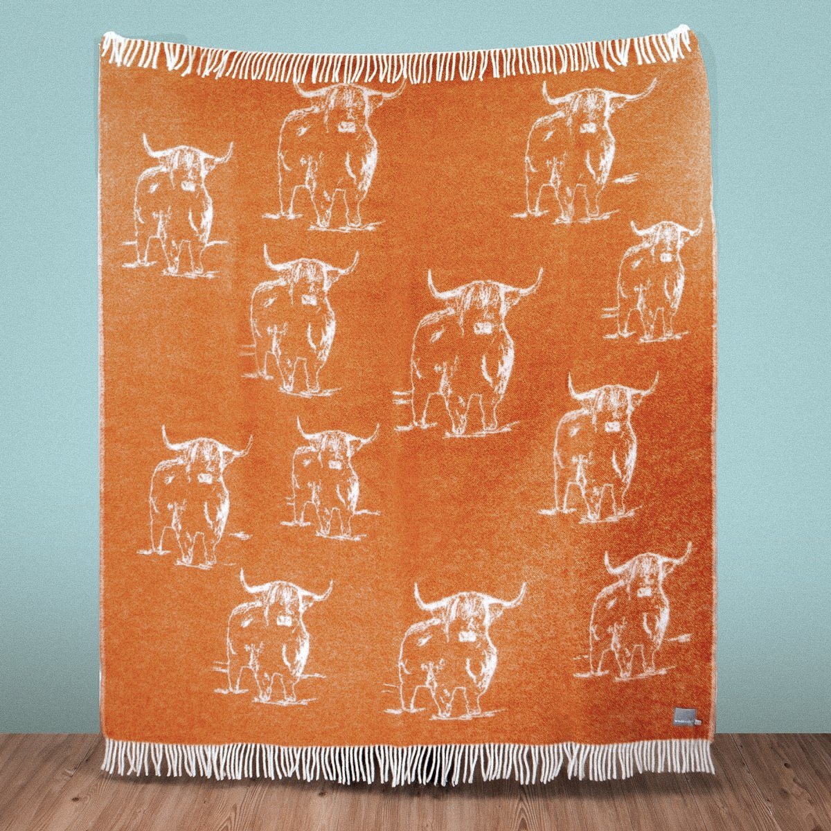 Product image of Wild and Wool Highland Coo Wool Throw - Rust by Woolroom – premium wool throws