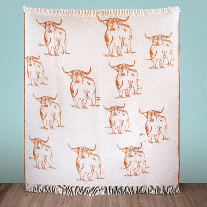 Close-up of Wild and Wool Highland Coo Wool Throw - Rust by Woolroom – sustainable wool throws 