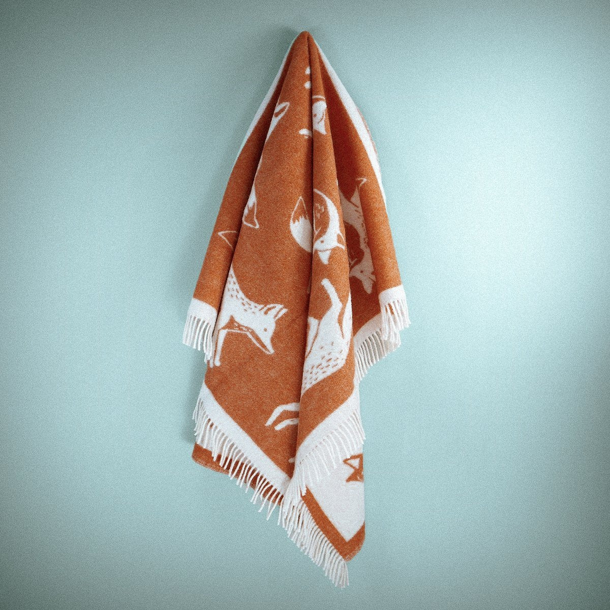 Wild and Wool Fox Wool Throw - Rust from Woolroom – natural wool throws for better sleep