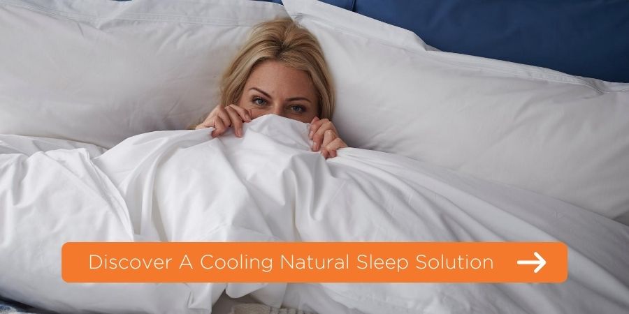 Women in bed with a link to a cooling natural sleep solution
