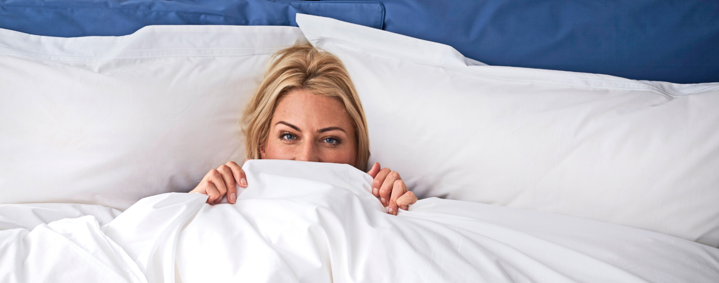 Woman Using Wool Bedding to Help Night-Time Itching